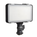 Shenniu M150 ultra-thin LED video light mounted on a mobile phone showing its slim profile.