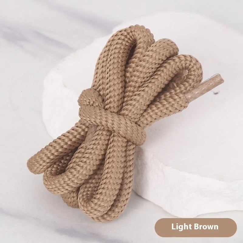 Oval elastic shoelace adapter ropes in various colours on a white background.
