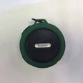 Waterproof portable Bluetooth speaker in multiple colours with mountaineering buckle attachment