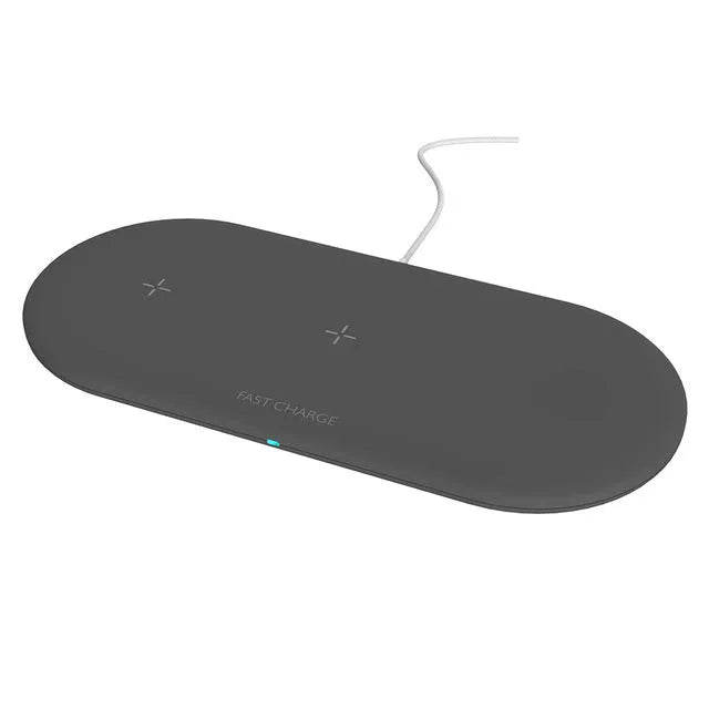 White 3-in-1 desktop wireless charger for Apple iPhone, watch and headphones on a wooden desk