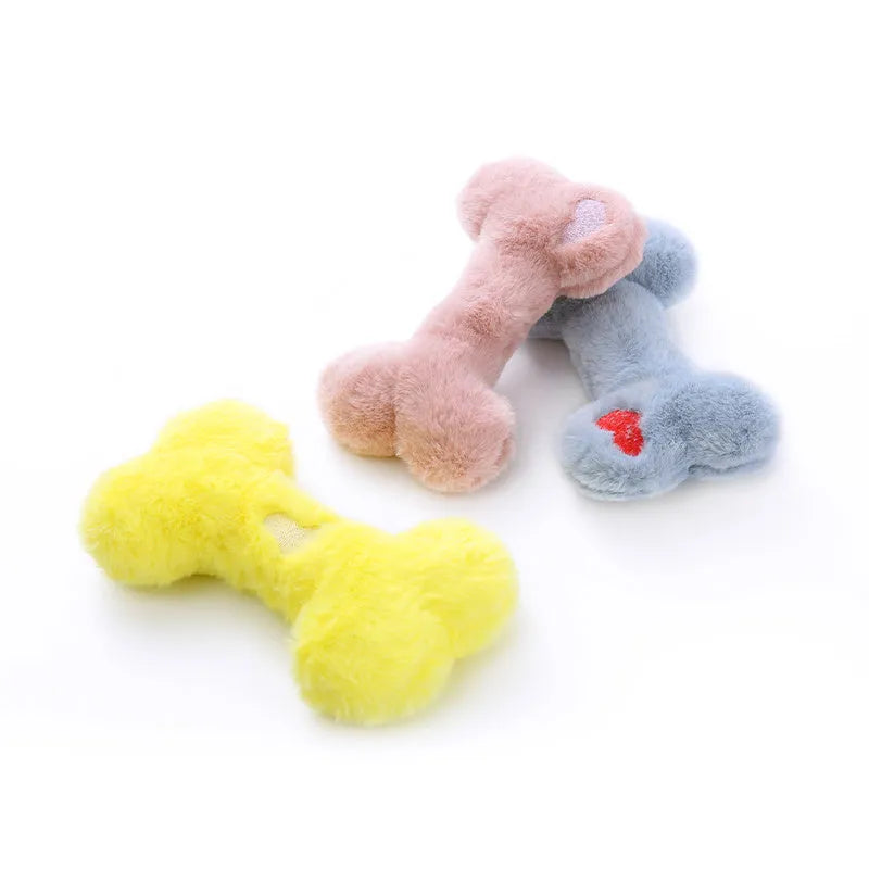 Blue plush bone-shaped dog toy with a squeaker for interactive bite-resistant play