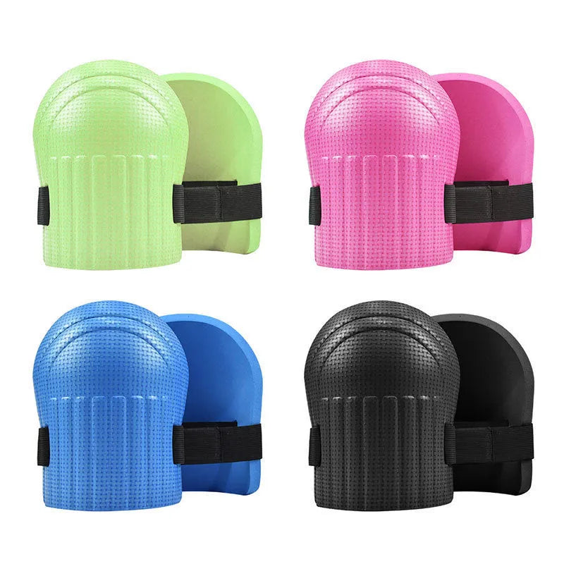 A pair of thick EVA foam kneepads in blue, shown on a hard floor surface.