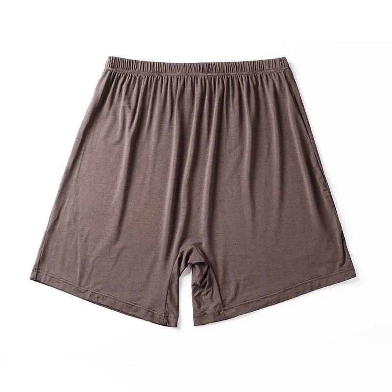 Men's solid colour modal boxers showing high waist design available in black, blue, gray and brown