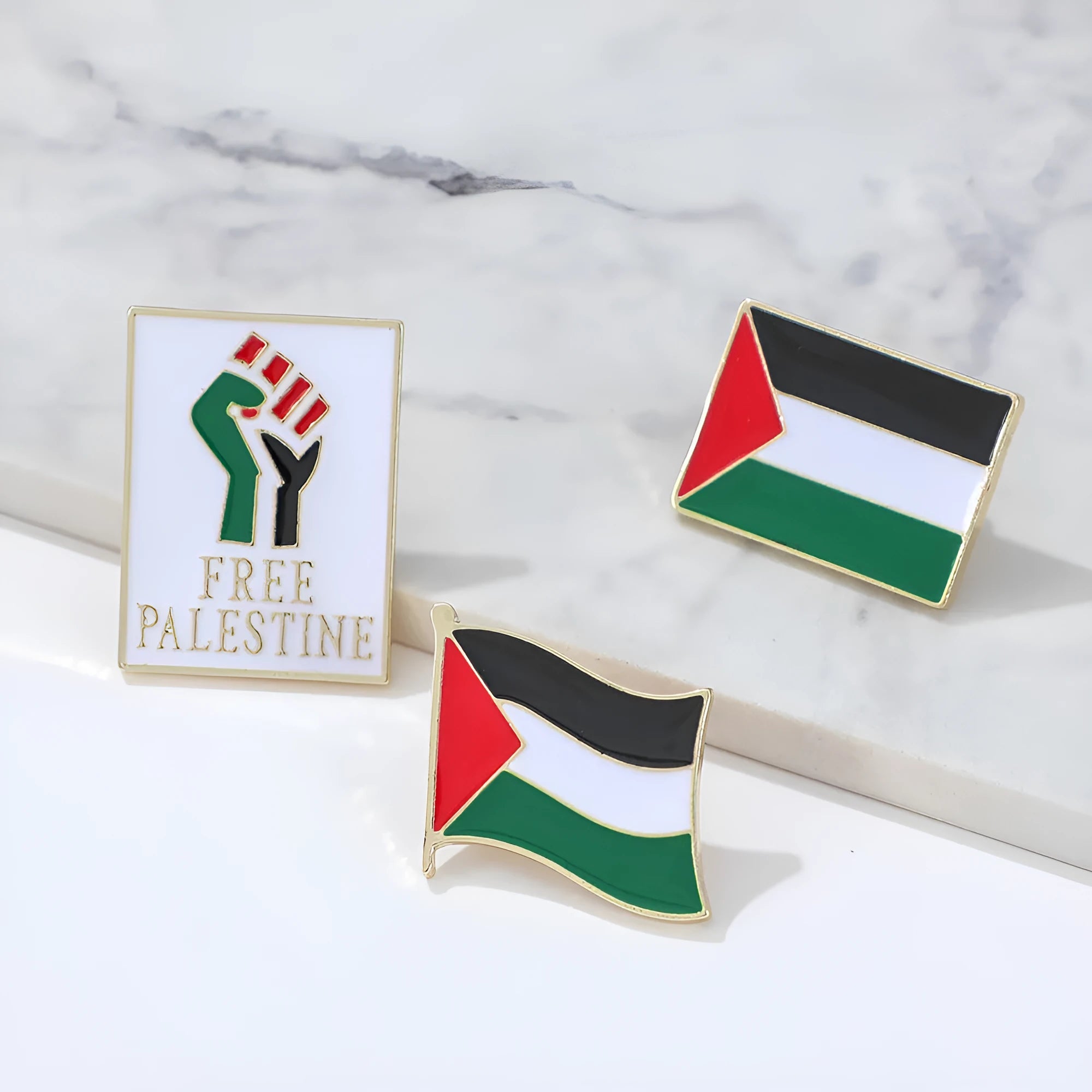 Square corrugated alloy brooch with Palestinian flag design on a neutral background