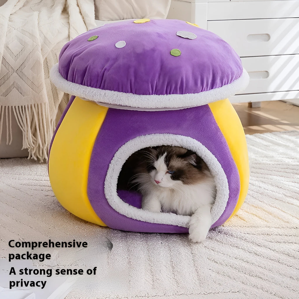 Purple mushroom-shaped plush cat bed for small pets on a grey background.