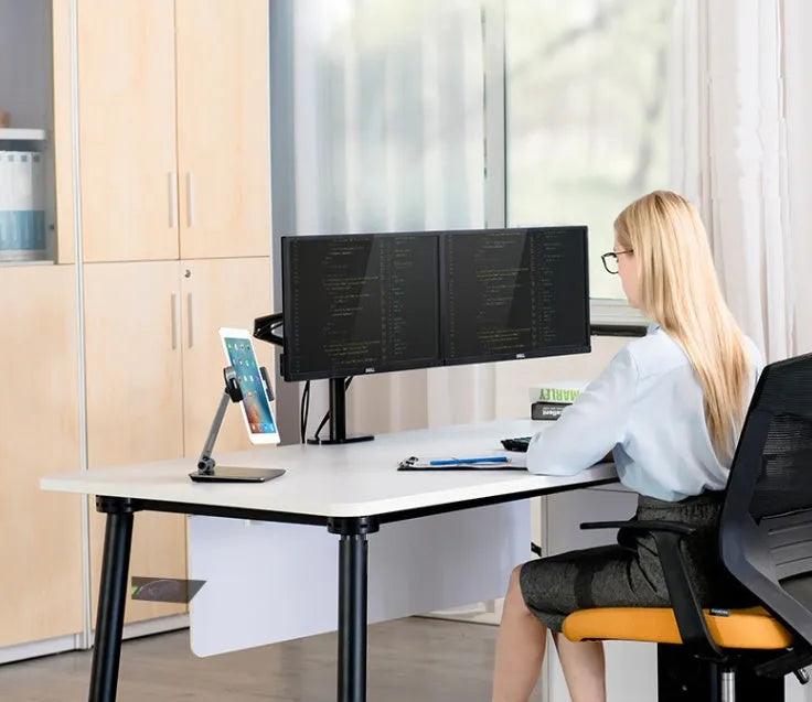 Foldable aluminium and ABS desktop stand holding a tablet at an angle.