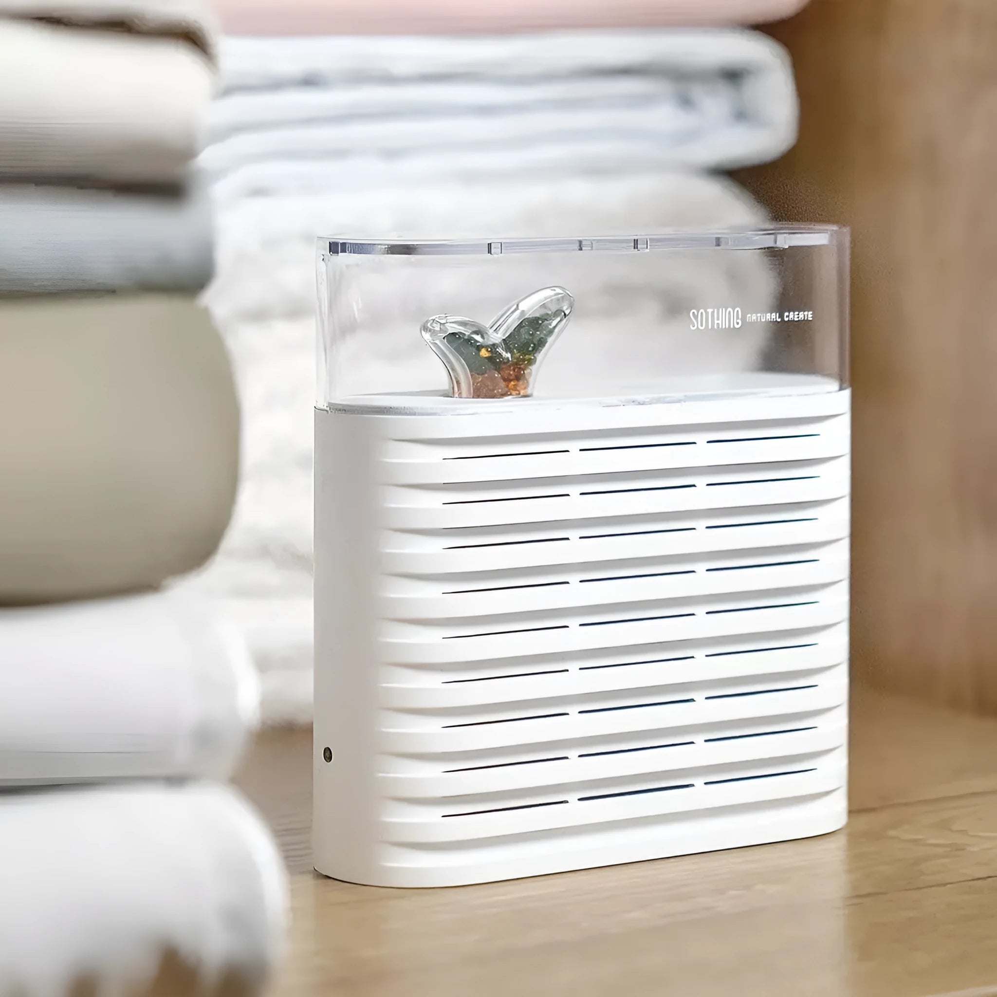 White recyclable cabinet dehumidification box with transparent top showing colour-changing silica gel beads