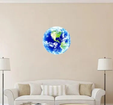 Glow in the dark 3D Earth planet wall sticker in three size options on a dark background