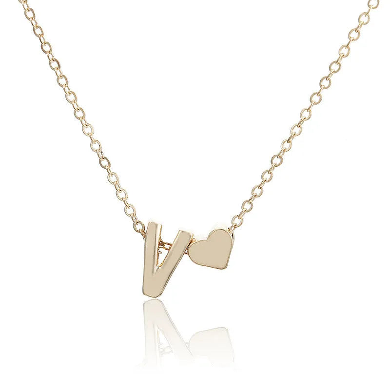 Peach heart shaped letter necklace pendant in gold and silver alloy colours