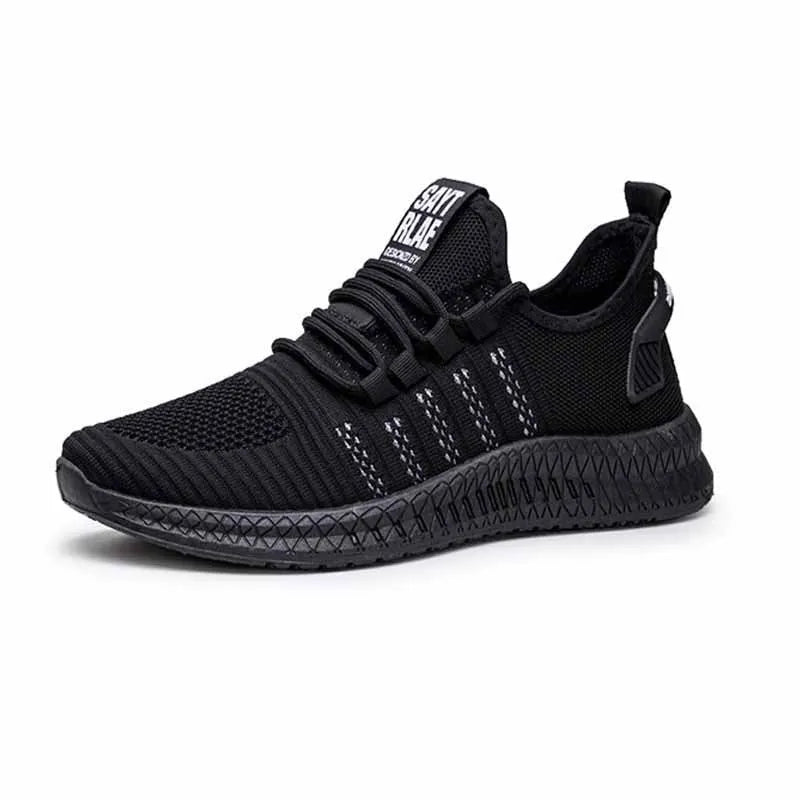 Men's low-top black casual sports shoes with cross strap detail and Flying Weave upper on a wear-resistant sole.