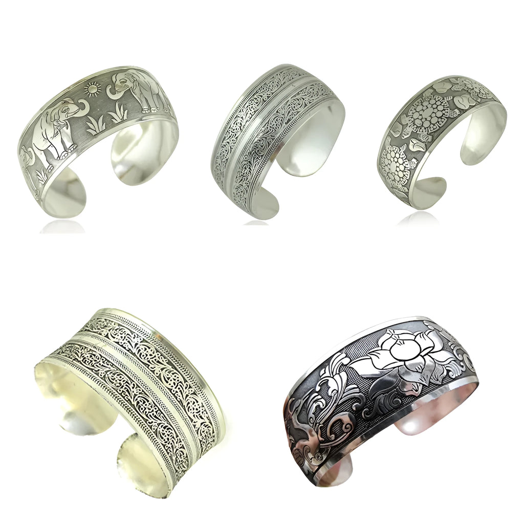 Ethnic carved open Miao silver bracelet in alloy with elephant or turtle colour finish
