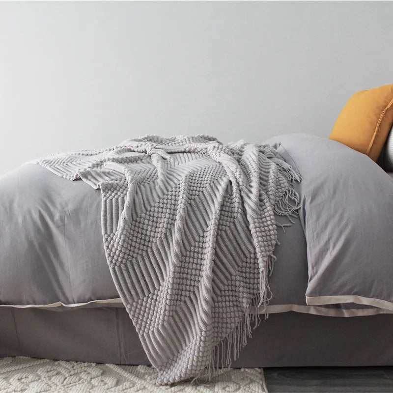 Small polyester nap blanket in dark grey, khaki, or light grey, dimensions 127cm by 170cm