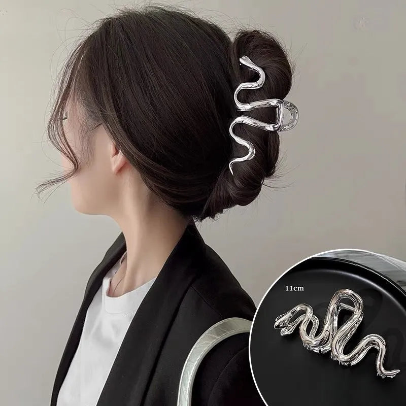 Slytherin serpentine metal hair barrette measuring 10.5 cm with electroplated finish