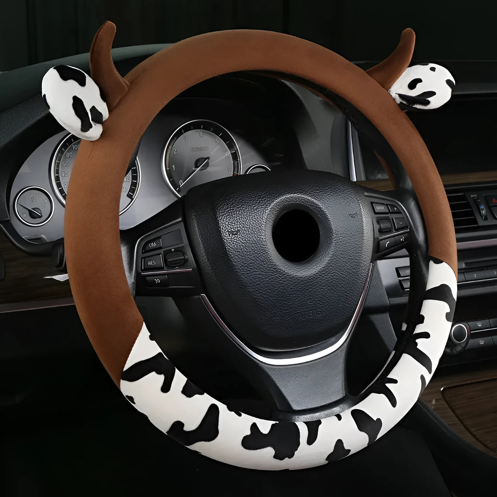 Short plush automotive steering wheel cover in black colour showing textured surface
