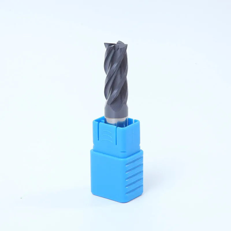 Carbide spiral flute milling cutter with straight shank on a grey background.
