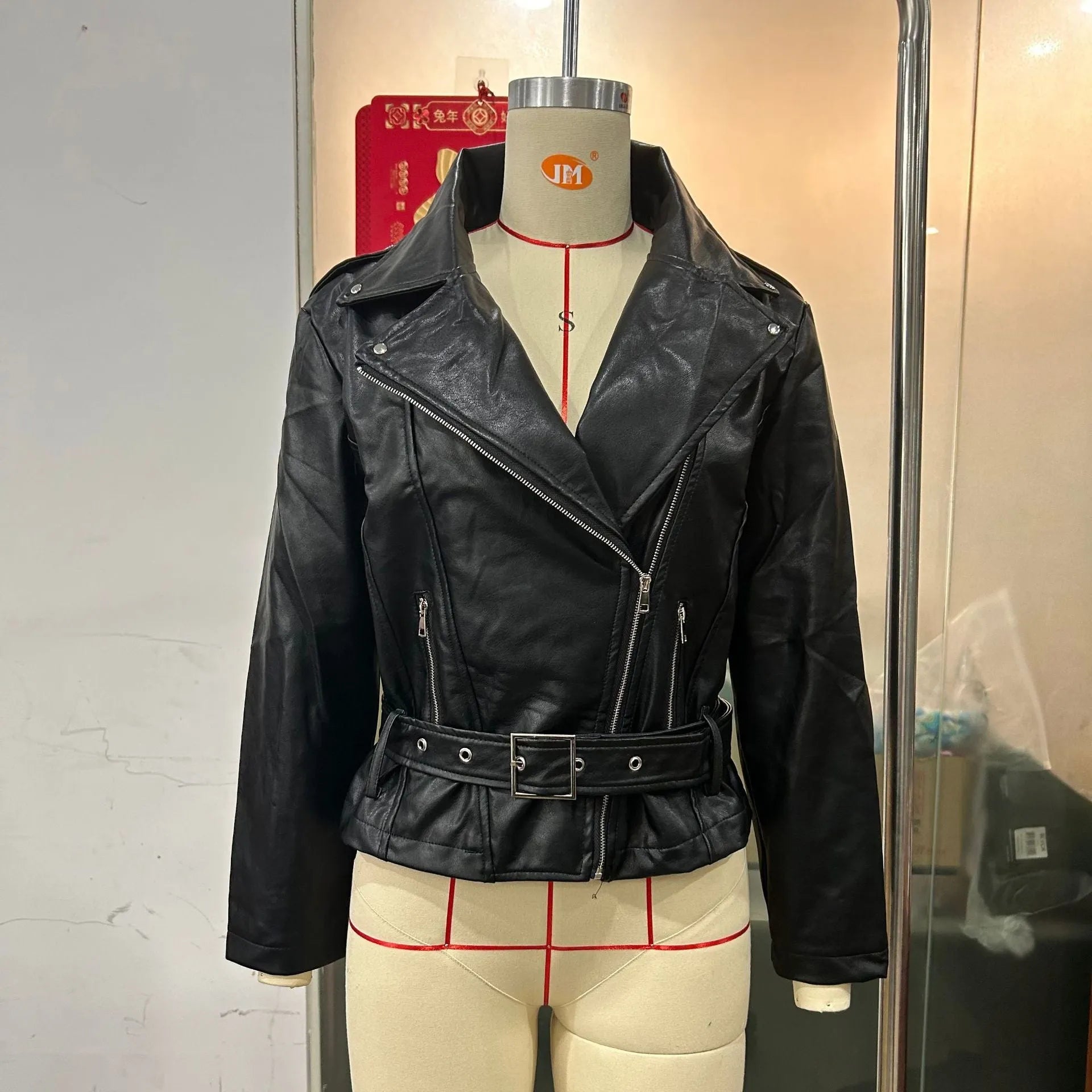 Black punk jacket with locomotive-style lapel and Peter Pan collar