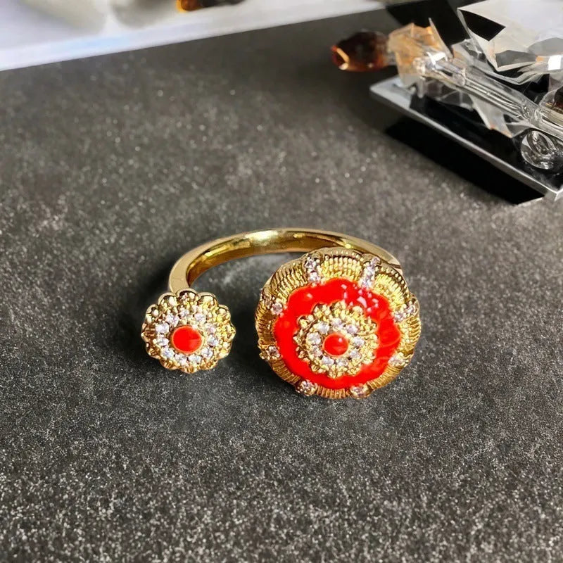Adjustable copper vintage gourd ring with inlaid zircon stones showing floral and bow design elements