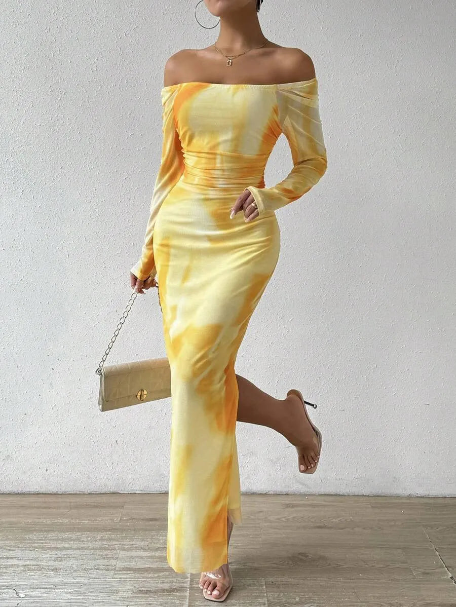 Printed pleated fishtail dress in mesh fabric with square collar and split design