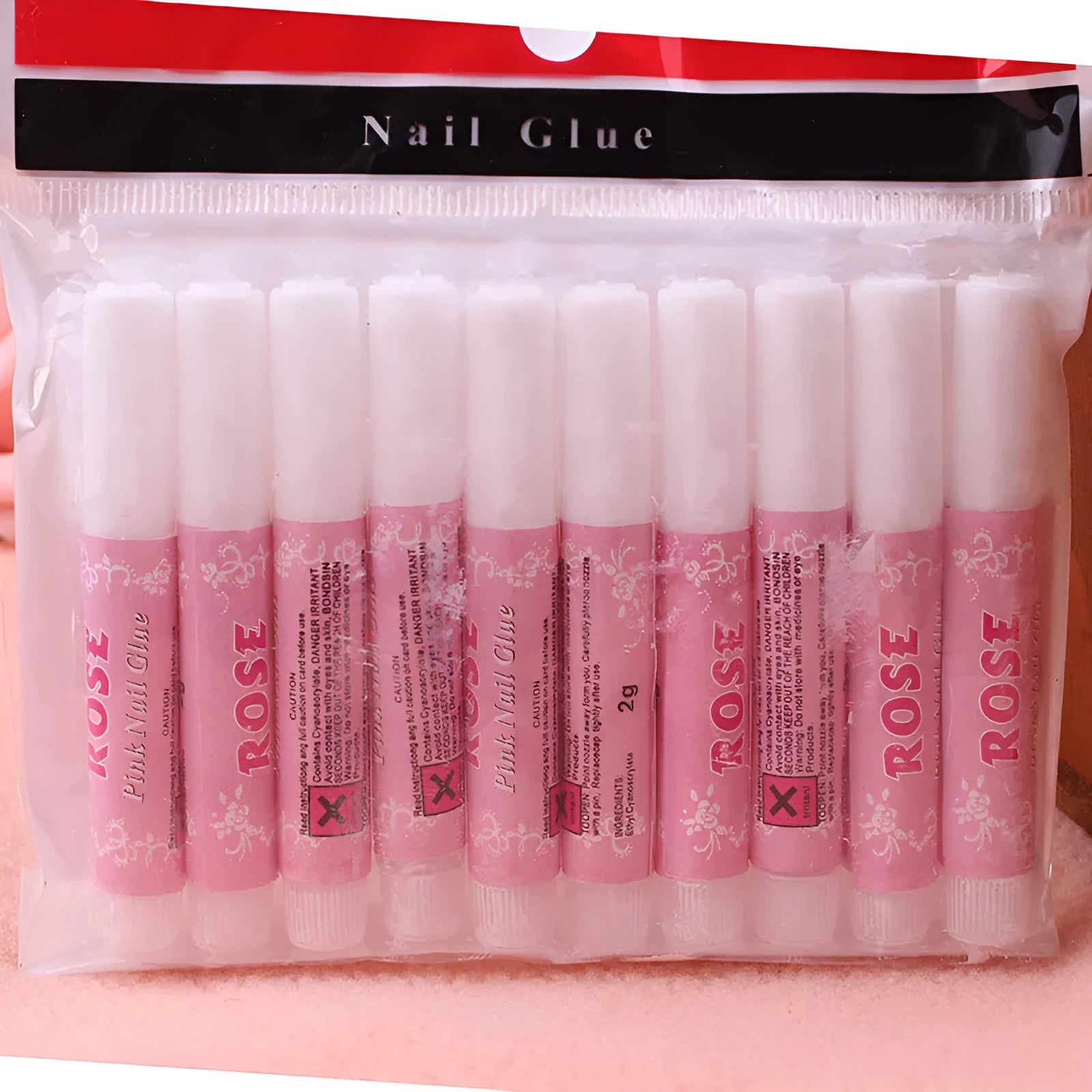 Small 2g tube of nail glue adhesive for press-on nails and nail art repairs