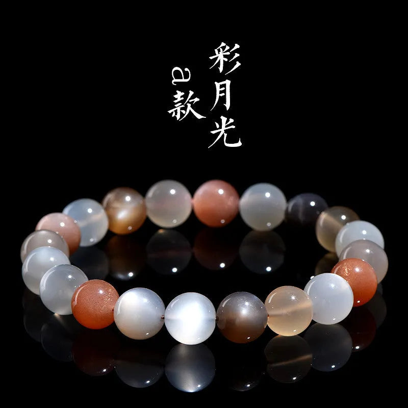 Natural moonstone colourful moonlight bracelet with 8mm beads in a single circle on a wrist.