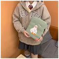 Blue cotton tablet case with embroidered cartoon duck design and zipper closure