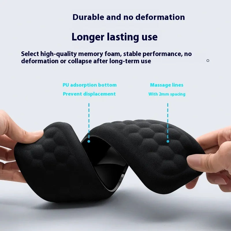 Memory foam mouse wrist rest pad with silicone base in black cloth cover option on desk
