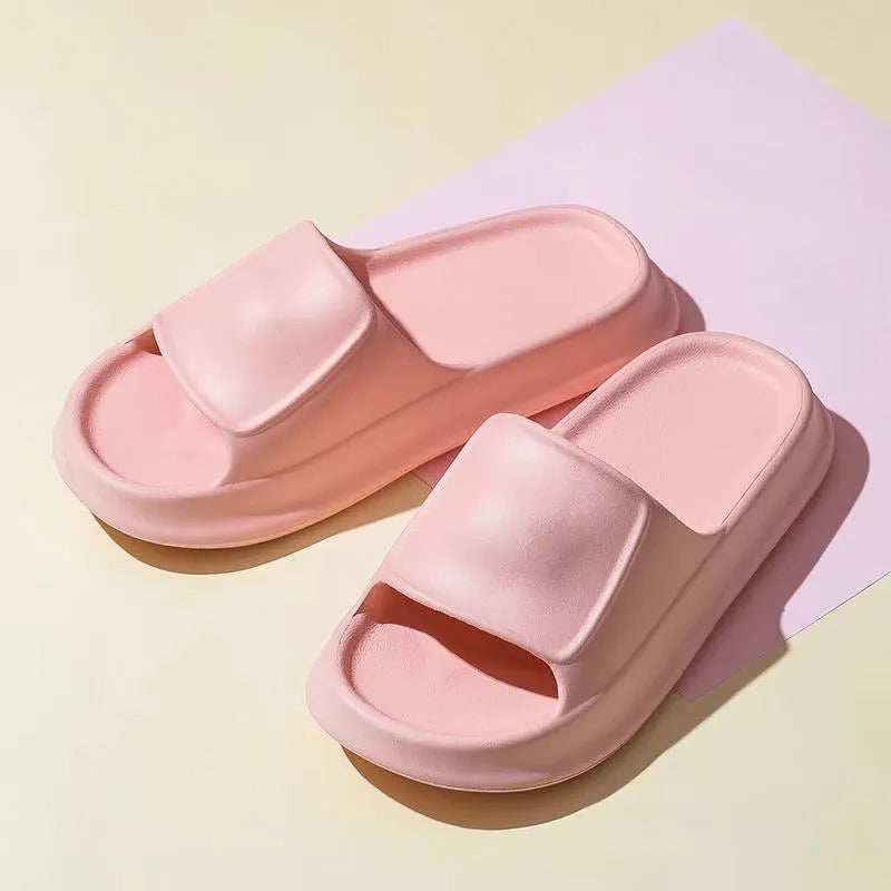 Pair of thickened EVA flip-flop slippers in a chosen colour, showing the non-slip sole and unisex design.