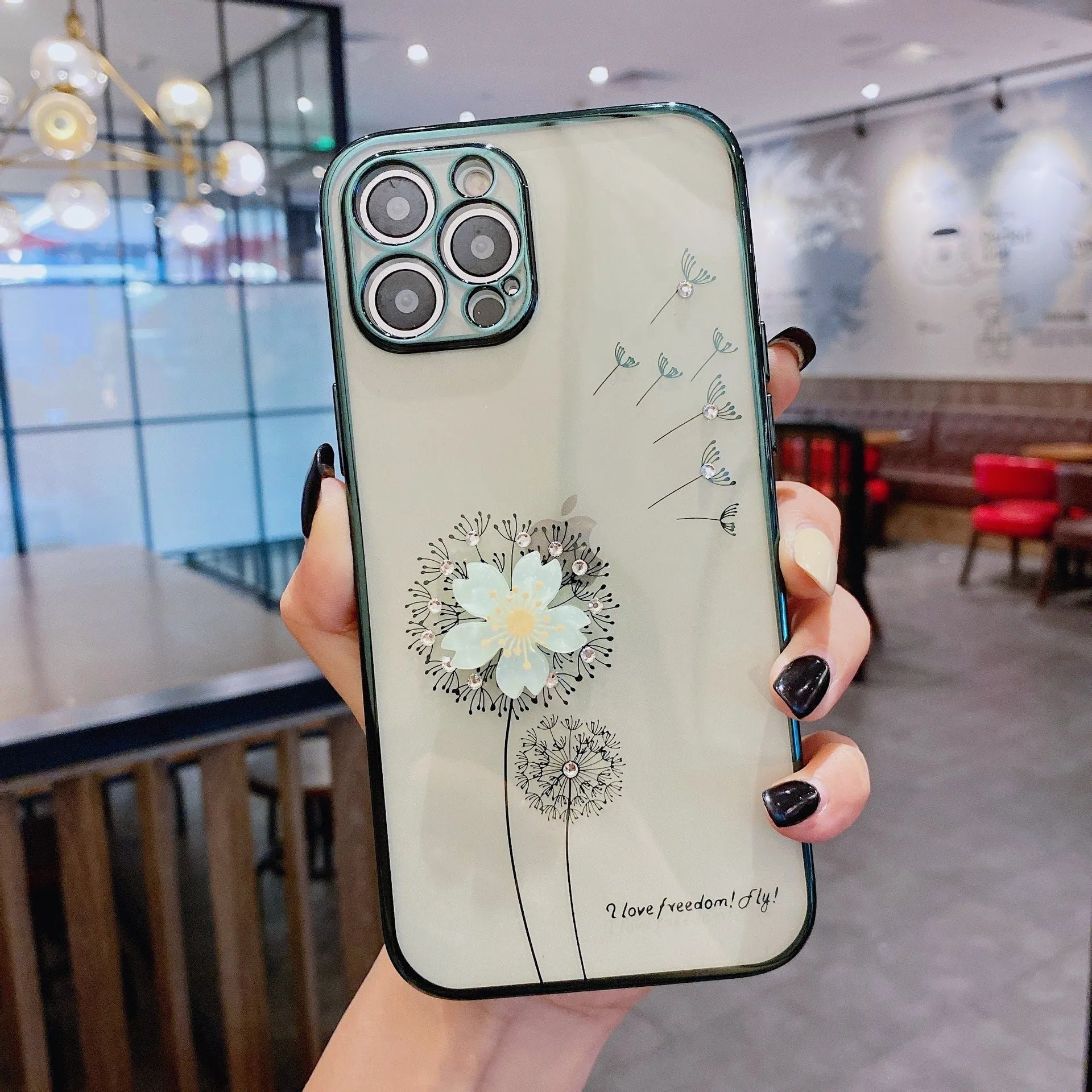 Green silicone iPhone case with a 3D floral design and a built-in spin stand on a white background.