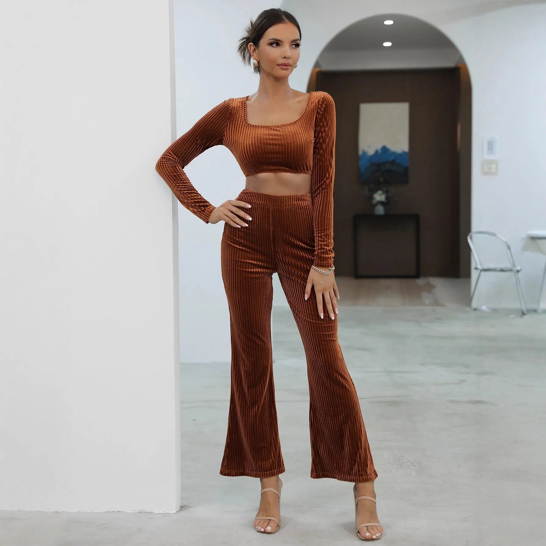 Caramel coloured long sleeve sweater and trousers set shown together