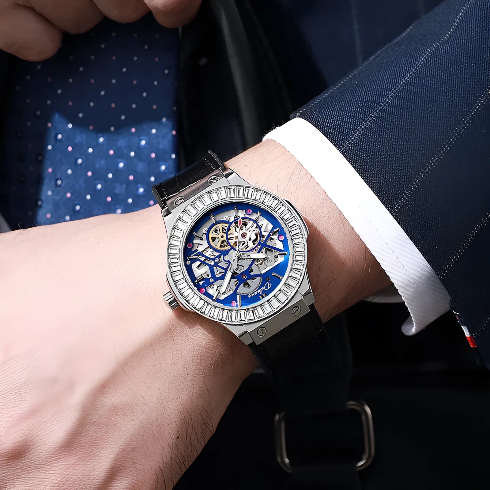 Men's automatic mechanical watch with skeleton dial and diamond bezel on wrist