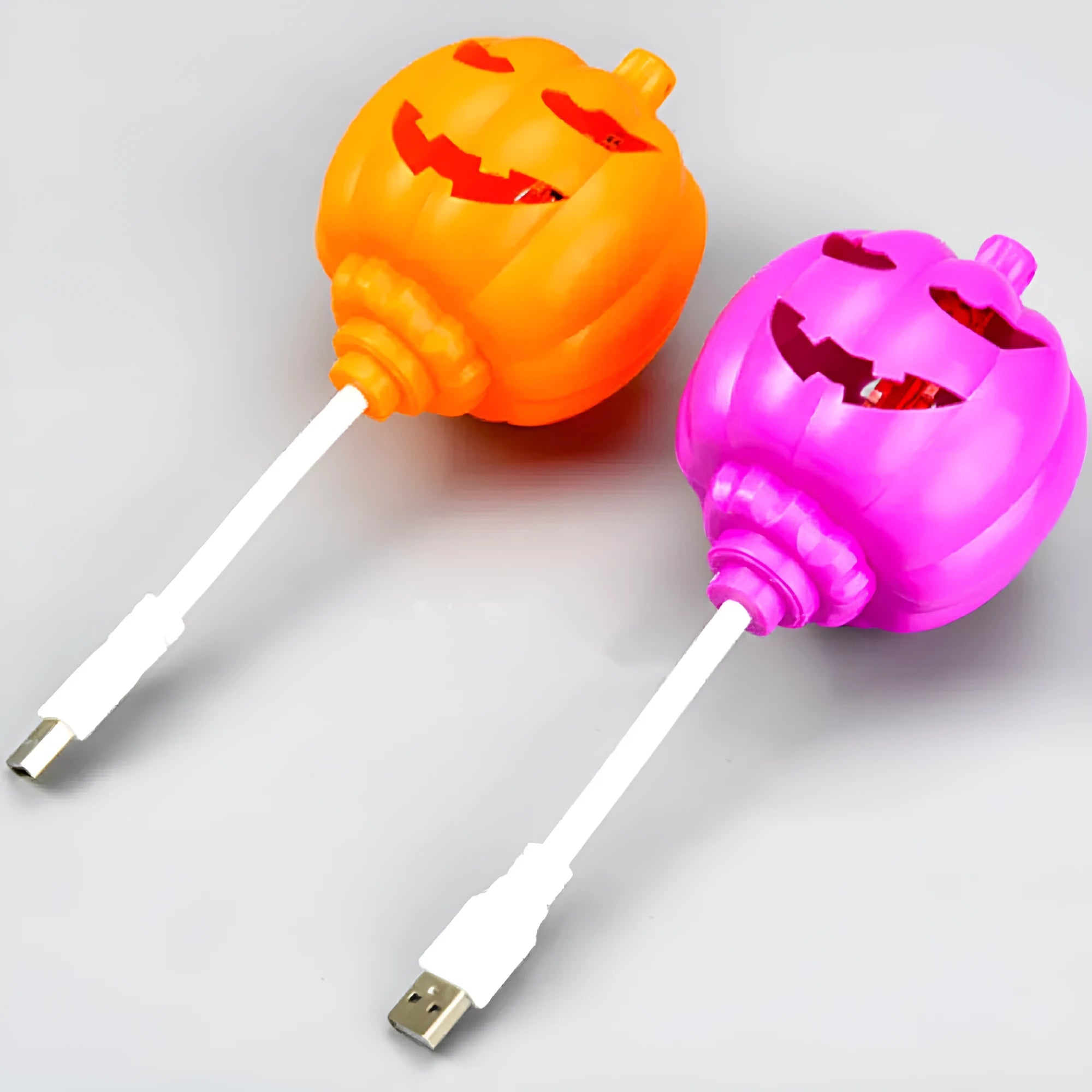 Plastic pumpkin lamp with USB cable for seasonal decoration in yellow or purple light