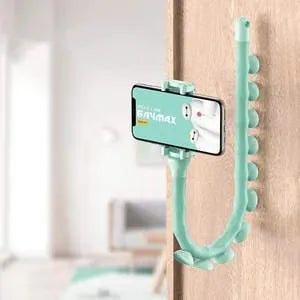 Black flexible worm arm phone holder with suction cup attached to a bicycle handlebar