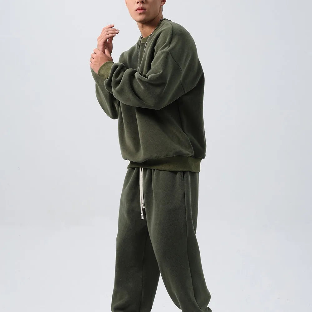 Men's polar fleece winter sports suit in five colour options showing crew neck top and matching trousers