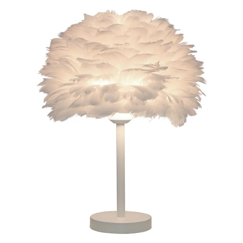 Handmade feather table lamp with metal base, available in white colour, approximately 30cm diameter and 40cm height