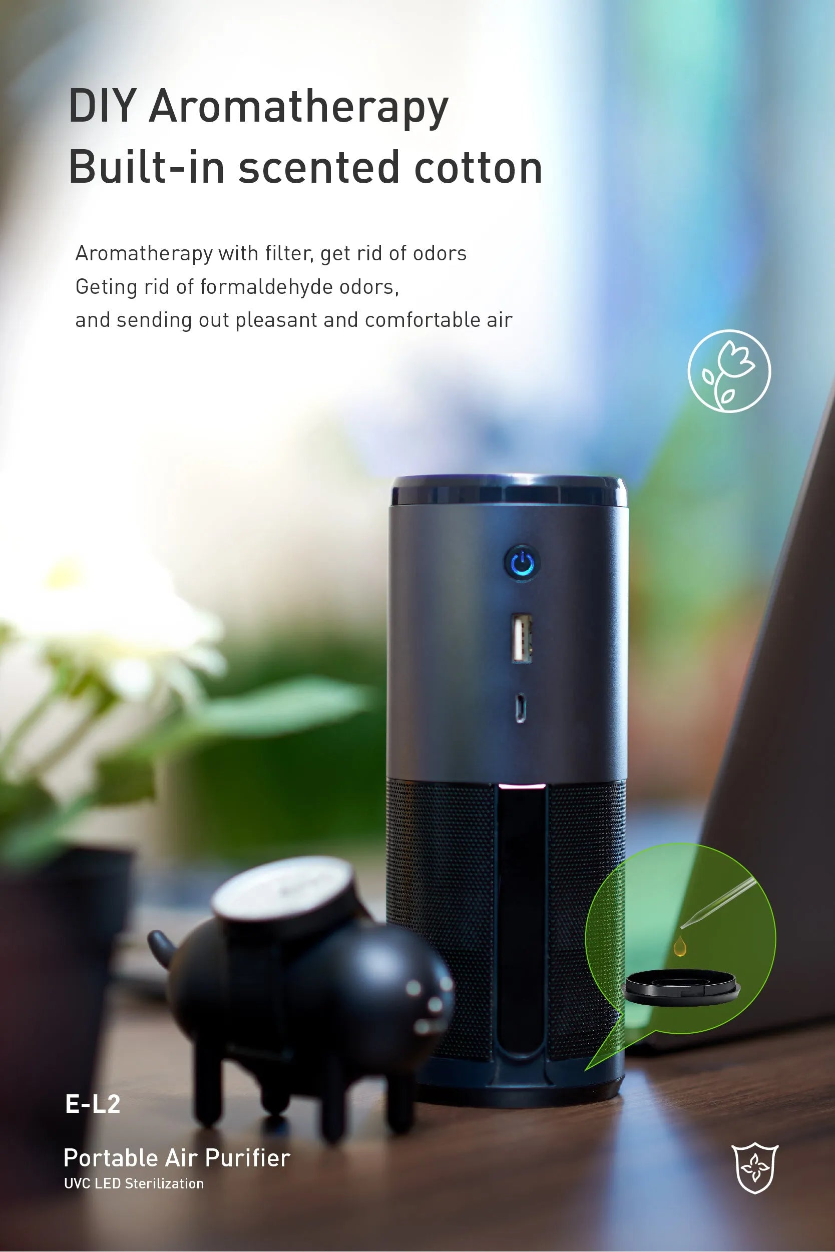 Black portable mini car air purifier with USB cable showing compact 6.2cm diameter design