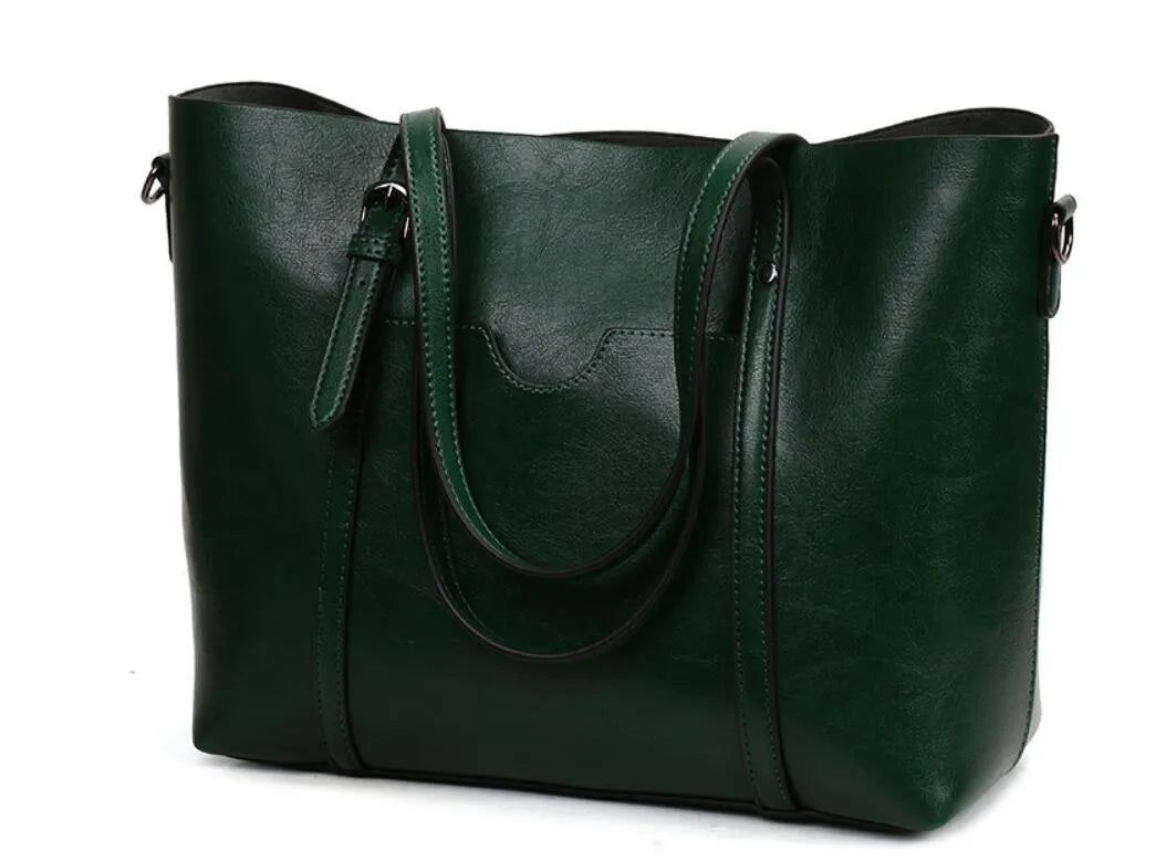 Retro messenger bag for women in multiple colours showing large main compartment and shoulder strap