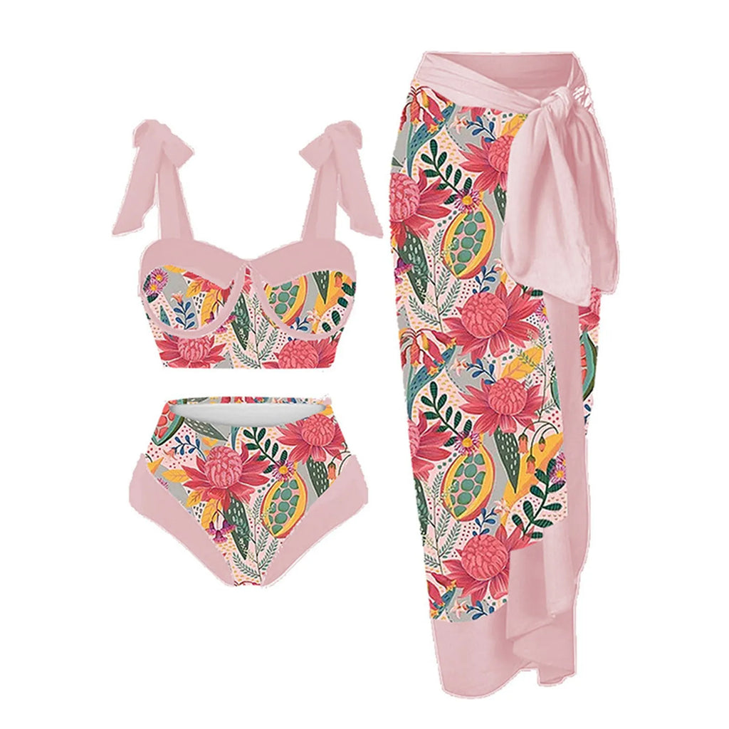 Women's pink printing split swimsuit three-piece set with skirt, bra, and panties on a mannequin.