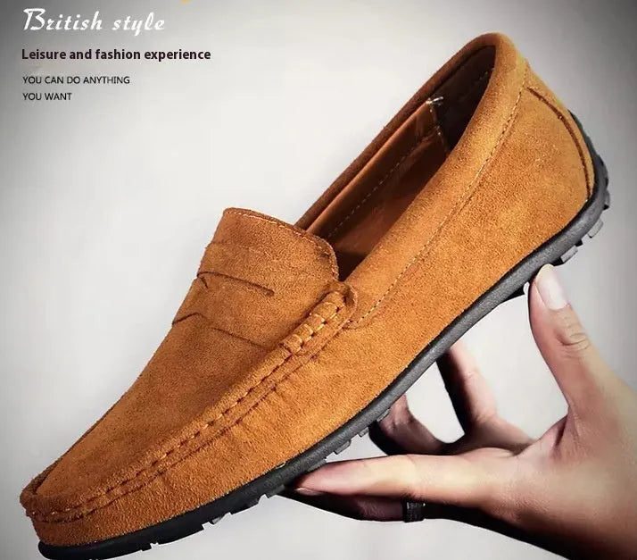Men's suede Gommino-style loafers in a range of colours on a flat rubber sole.