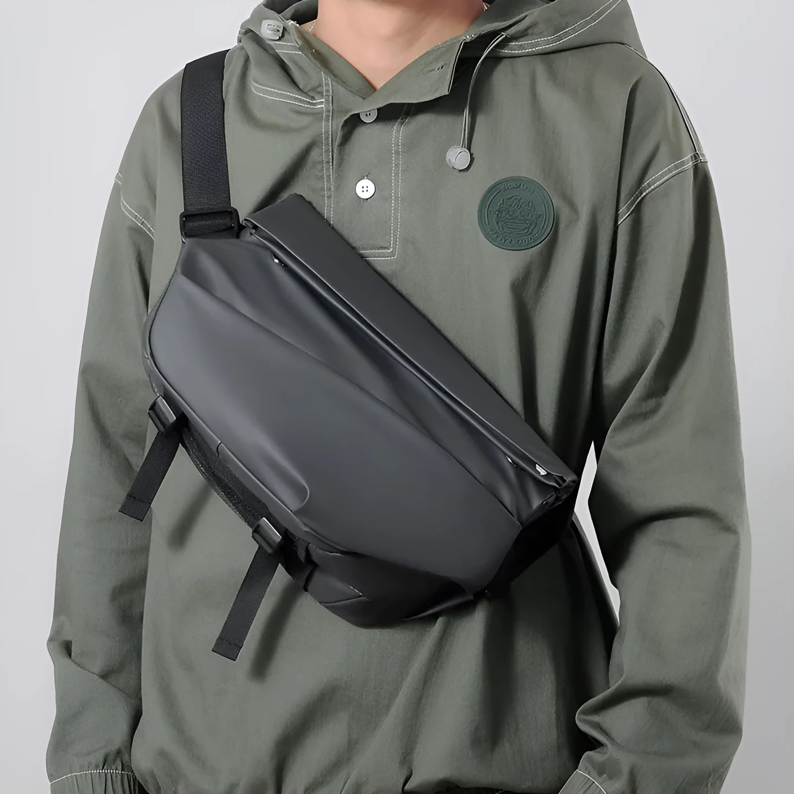 Grey PU leather crossbody bag showing internal phone pocket and document sleeve organisation