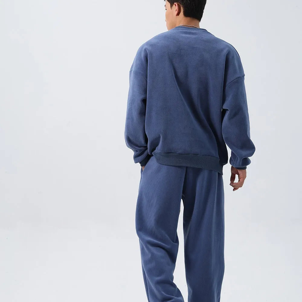 Men's polar fleece winter sports suit in five colour options showing crew neck top and matching trousers