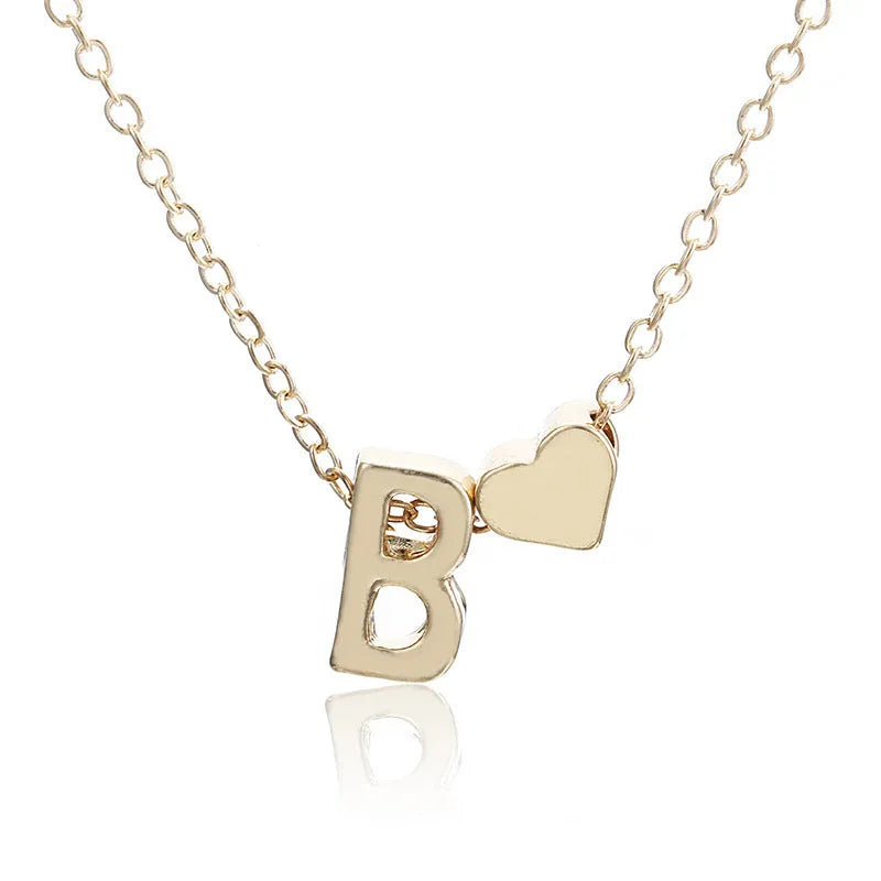 Peach heart shaped letter necklace pendant in gold and silver alloy colours