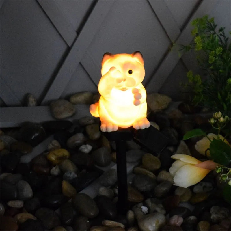 Brown and grey cat-shaped solar lawn light for garden decoration