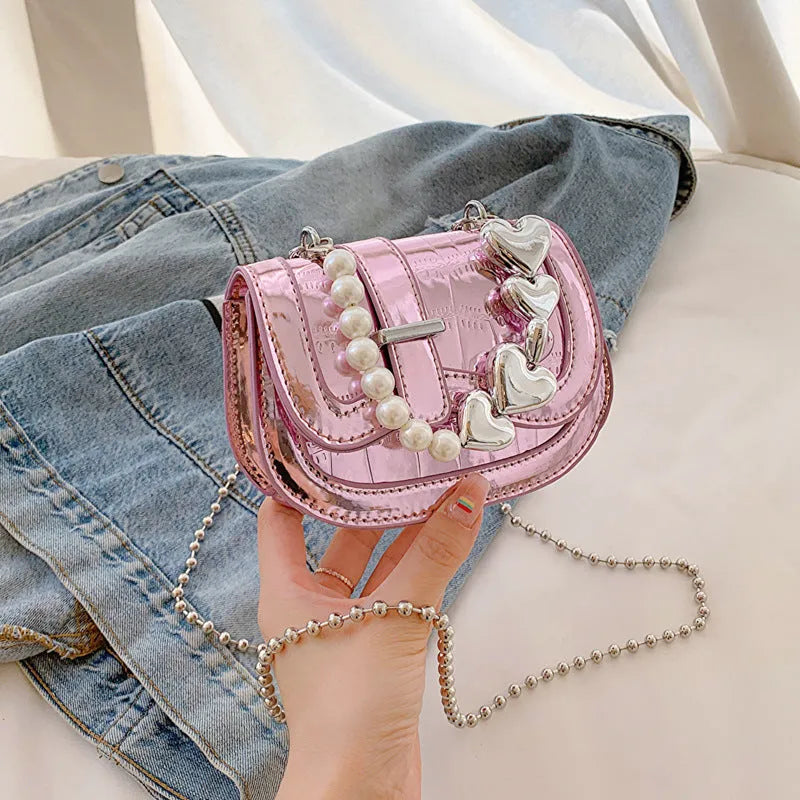 Silver PU leather mini tote saddle crossbody bag for women with a single strap.