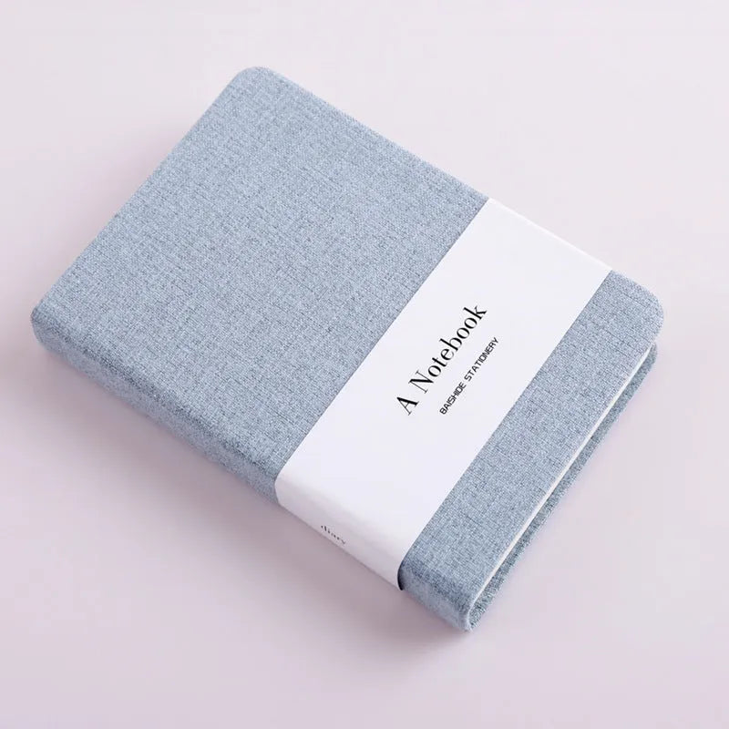 Wire-bound notebook with cloth cover, 132 pages, small size, blue colour