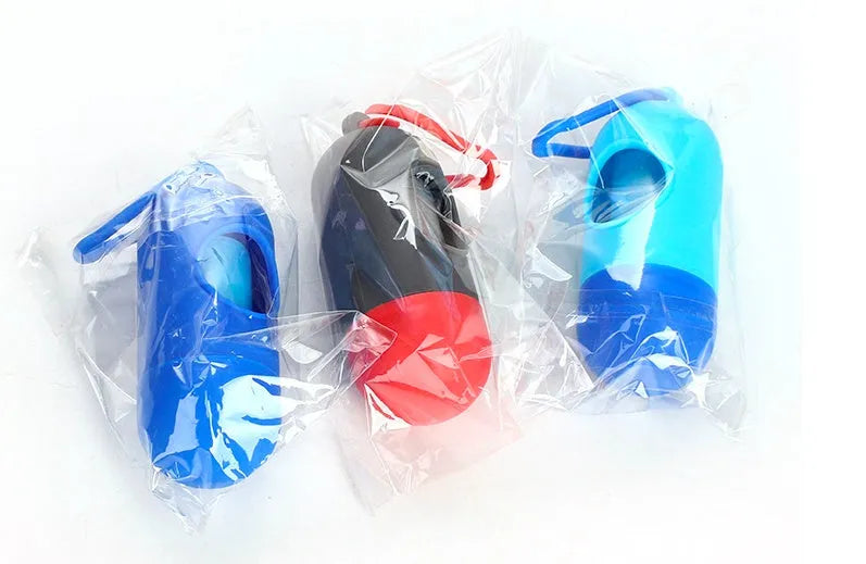 Roll of handled dog poop bags in assorted colours showing dimensions of 22.5 by 30 centimetres
