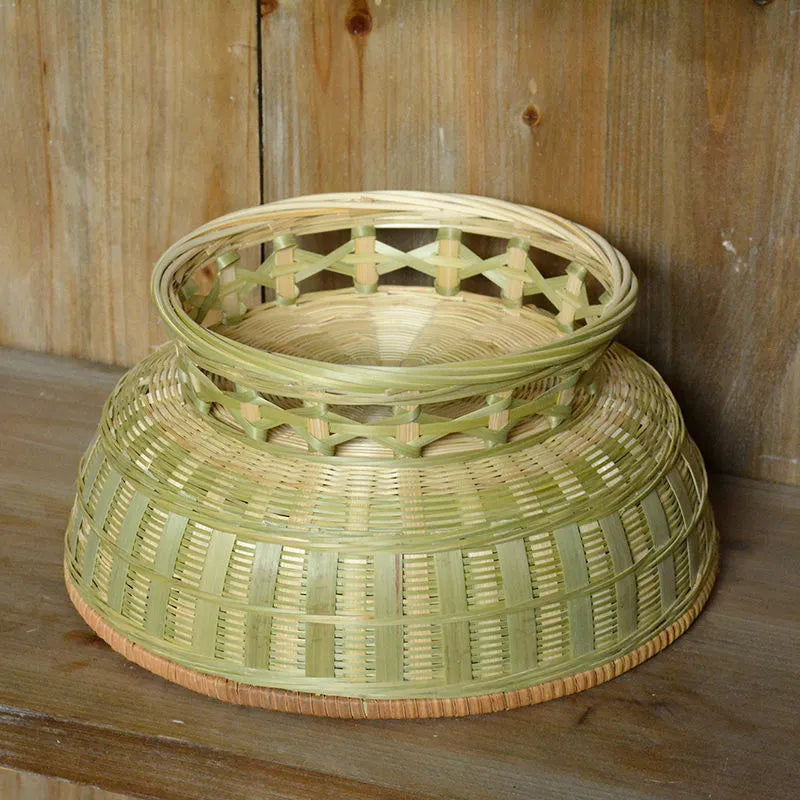 Handmade natural bamboo storage basket in a rectangular woven shape.