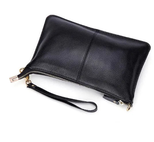 Structured cowhide leather lady slant bag showing front zipper compartment and dual strap options