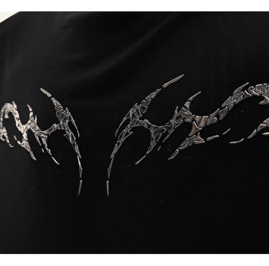 Man wearing a black slim fit long sleeve mesh base layer shirt.