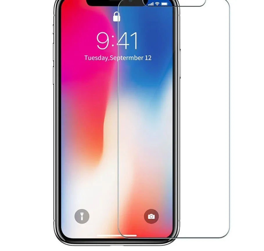 Tempered glass screen protector with 9H hardness for smartphones on a clean surface.