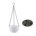 Plastic hanging basket with chain and inner pot in one of seven colours.